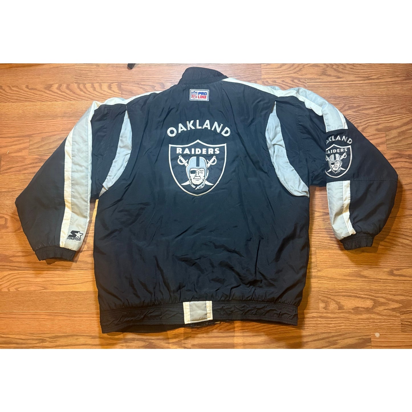Pro Line Starter Oakland Raiders Puff Zip Size XL