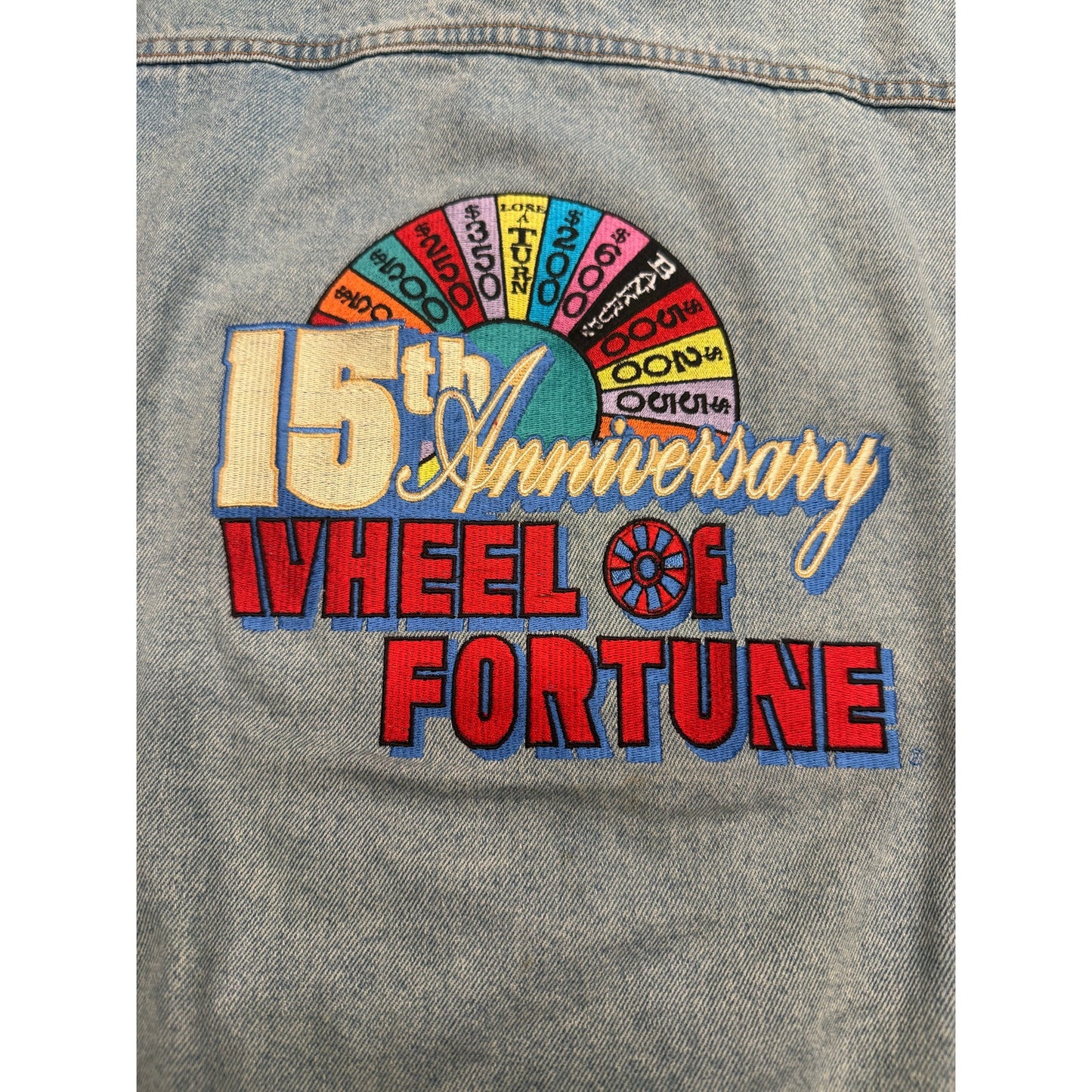 15th Ann. of wheel of fortune denim jacket